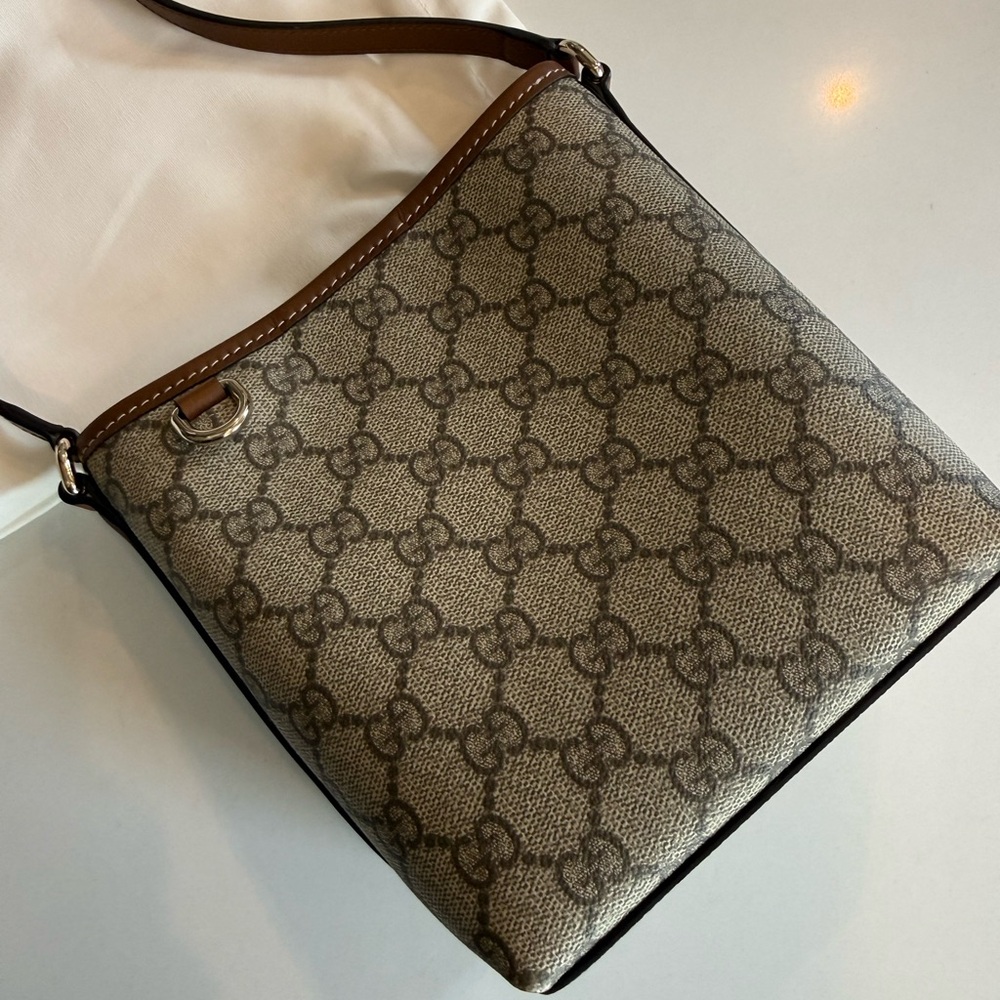 Gucci Emblem Nano Beige GG Supreme Canvas Bucket Bag with Brown Trim